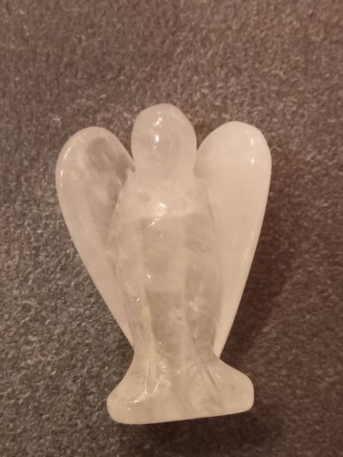 Angeli in pietra quarzo rosa