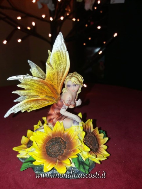 Fata seduta su Girasole (12,5cm)