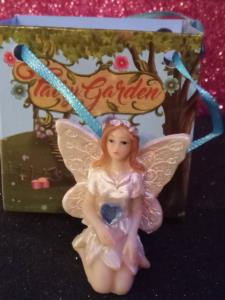 Fatina dei fiori bianca cuore azzurro