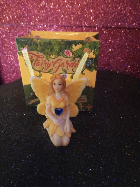 Fatina dei fiori gialla cuore azzurro