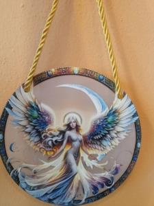 decorazione da finestra con angelo